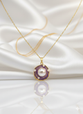 A pearl with enamel