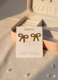 Orb bow earrings